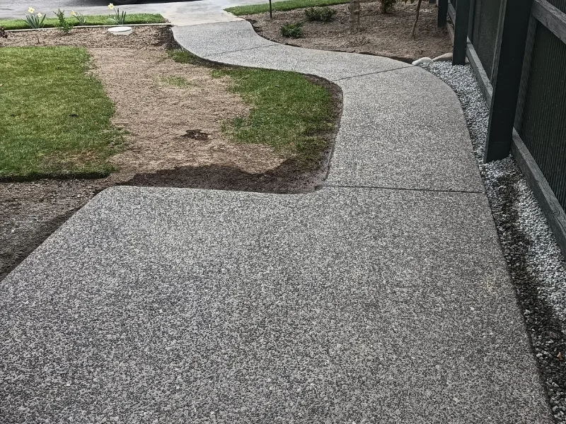 Replaced exposed-aggregate concrete path